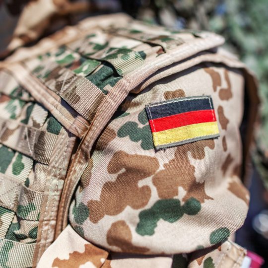 german flag on a german soldier desert uniform